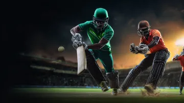 একজন পুরুষ তার ল্যাপটপে জয়ের মুহূর্ত উদযাপন করছেন, চারপাশে ভাসছে গেমিং আইকন—যা 456BDBET গেমসের উত্তেজনাকে প্রকাশ করে।